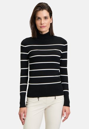 Black turtleneck sweater featuring white horizontal stripes, made from a smooth fabric, with fitted sleeves and a straight hem.