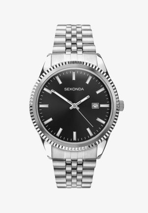 Montre en acier inoxydable argenté avec un cadran noir, des index d'heure minimalistes et un affichage de la date. Possède une lunette texturée et un bracelet à maillons.