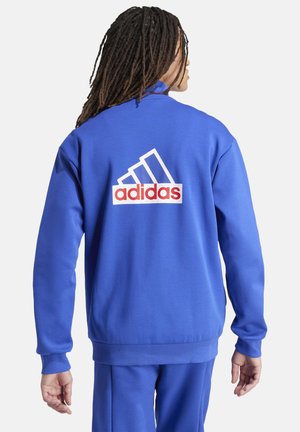 Blauwe crewneck sweatshirt met een rood-wit adidas-logo op de achterkant, ribgebreide boorden en een casual pasvorm. Gemaakt van zacht textielmateriaal.