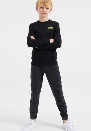 Pantalones deportivos - black