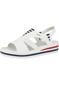 Weiße Leder-Sandale mit Ausschnitten, elastischen Riemen und einer geschichteten Sohle mit roten und marineblauen Streifen. Texturiertes Profil für besseren Halt.