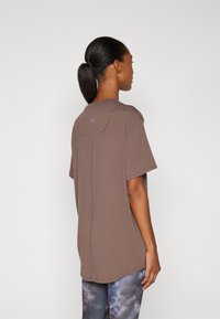 Nike Performance ONE RELAXED TOP - Camiseta deportiva - ironstone/black