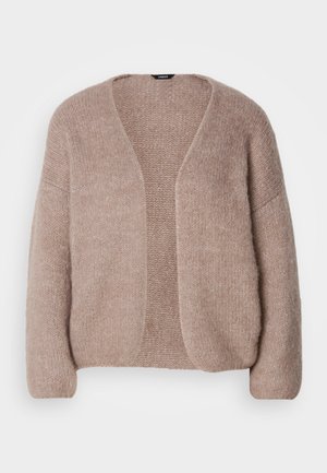 Cardigan en tricot beige avec un col en V, des manches larges et un design ouvert. Texture douce avec un motif de tricot légèrement épais.
