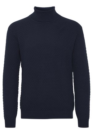Navy blue sweater with a textured honeycomb knit design, high ribbed neckline, and ribbed cuffs and hem. Classic fit long sleeves.