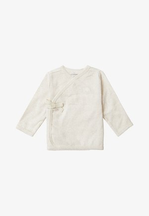 Light beige long-sleeve wrap top made from ribbed fabric. Features a small bow detail at the front and delicate frayed edges.