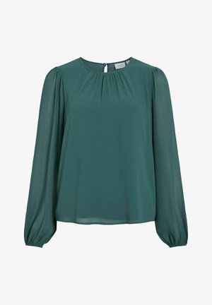 Žalia ilgomis rankovėmis palaidinė, pagaminta iš lengvo audinio, su apvaliu iškirpimu, raukšlėtu akcentu ir elastiniais manžetais. Užsegimas nugaros dalyje su skiltele.