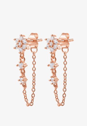Pendientes en oro rosa con un diseño floral adornado con cristales transparentes, colgando de una cadena delicada. Los pendientes están asegurados con cierres a presión.