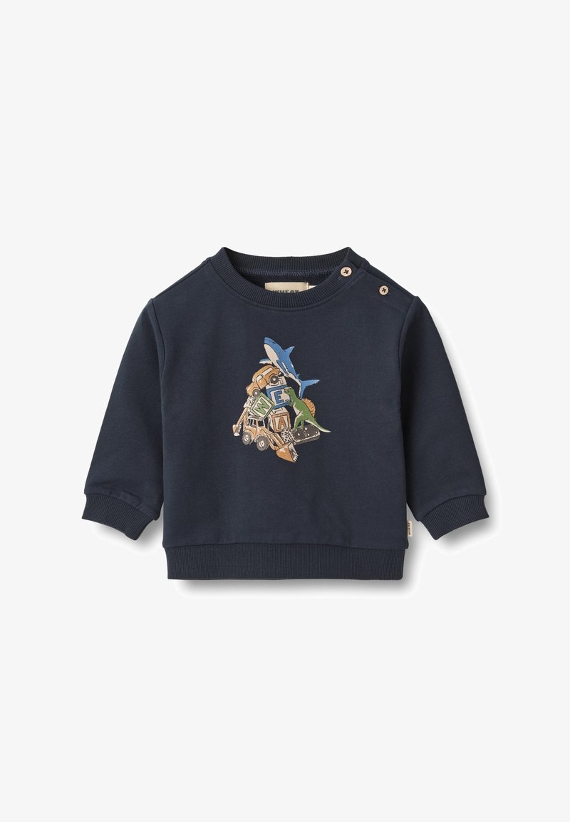 Felpa blu navy in morbido cotone, con un design ricamato di un dinosauro, uno squalo e veicoli. Bottoni a pressione sulla spalla.