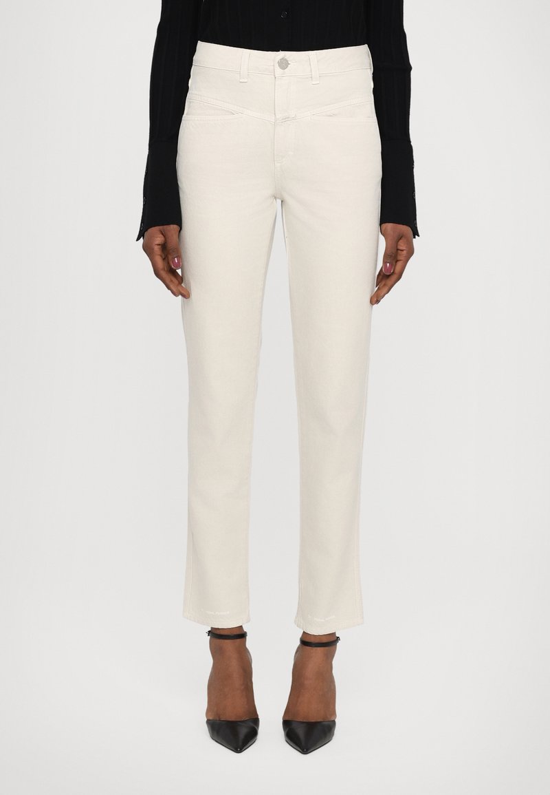 White denim jeans with a straight leg design. Features a high waist, subtle stitching details, and a classic button closure.
