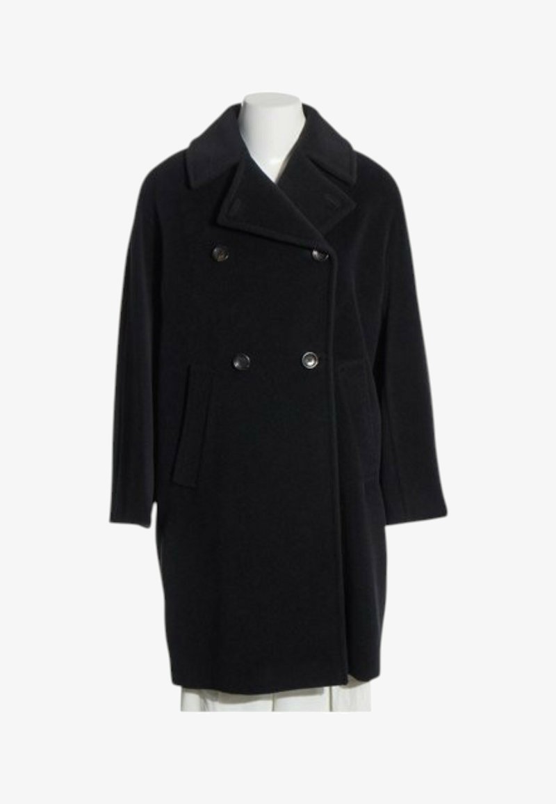 Manteau en laine noir à double boutonnage avec larges revers et poches latérales présenté sur un mannequin blanc.