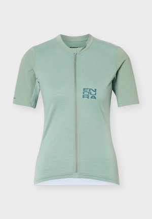 Svetlozelený cyklistický dres s krátkym rukávom so zipsom vpredu a logom „ENDURA“ na ľavej strane na hrudi.