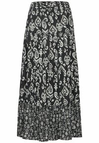 Jupe noire avec motifs paisley et géométriques blancs complexes. Design évasé avec un ourlet à volants et une taille ajustable.