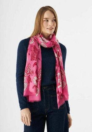 Rosa Blumen-Schal aus leichtem Material, mit weißen Blumen und Blattmustern, am Rand mit einem subtilen Fransen-Detail verziert.