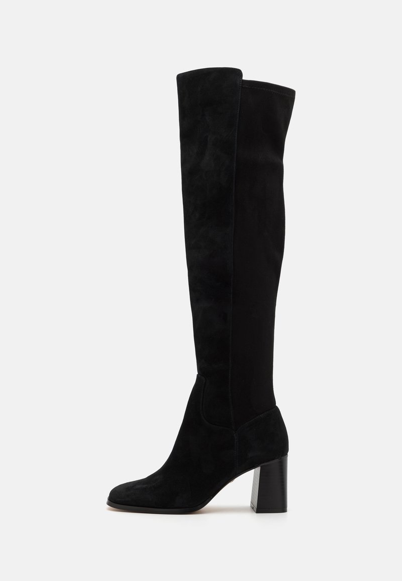 Black suede over-the-knee boots with a textured finish, rounded toe, and a chunky, square heel. Elegant design with a fitted silhouette.