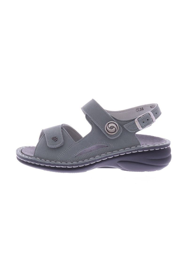 Gray open-toe sandal featuring a suede-like material, adjustable straps, decorative swirl accent, and a cushioned black sole.