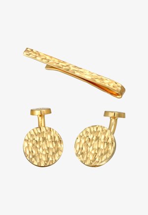 Boutons de manchette en or avec une texture martelée, en forme circulaire, et une pince à cravate assortie présentant un design texturé similaire.