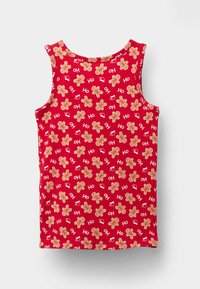 Červený top bez rukávů z měkké látky s opakujícím se vzorem perníčků a nápisem "Ho", s kulatým výstřihem.