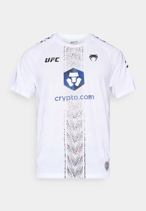 White athletic t-shirt with UFC logo, featuring a textured stripe pattern at the center and a blue "crypto.com" graphic. Short sleeves.