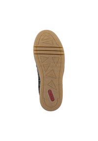 Black knit sneaker sole features a textured gum rubber bottom with triangular patterns and a red logo. Designed for grip and durability.