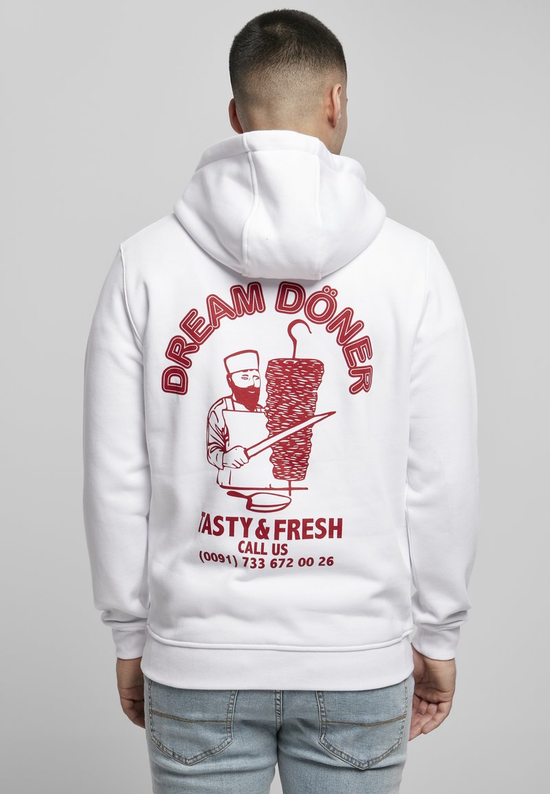 Hvit hettegensere med trykt grafikk av en kokk med en döner kebab, rød tekst som sier "DREAM DÖNER TASTY & FRESH," og kontaktinformasjon.