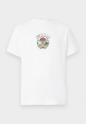White cotton t-shirt featuring a colorful graphic print with the word "STANCE" above a character holding a book and wearing sandals.