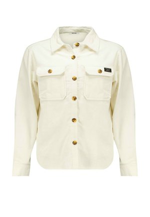 Weißes Cordhemd mit langen Ärmeln, Knopfleiste, zwei Brusttaschen und gelb-braunen Knöpfen. Verfügt über einen umgeschlagenen Kragen und ein Etikett-Detail.