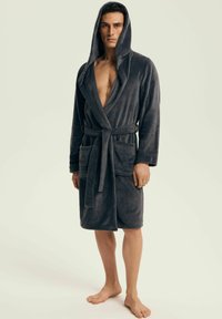Gray hooded bathrobe made of soft fabric, featuring a waist tie, two front pockets, and a knee-length design.