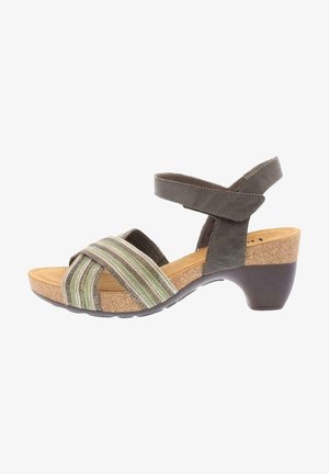 Sandale à talons pour femmes avec semelle en liège, bride de cheville marron et brides avant en croisillon rayées dans des tons de vert et de beige.