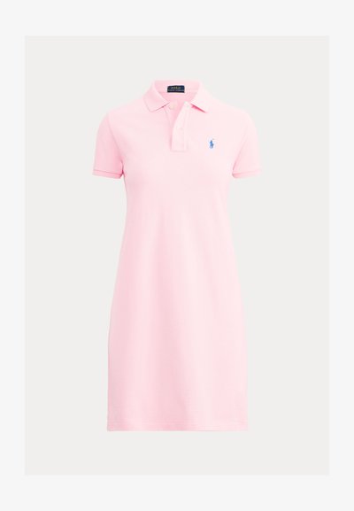 Pink short-sleeve polo dress with collar, two-button placket, and small blue embroidered logo on the left chest.