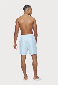 Pegador LOGO  - Calções de banho - baby blue