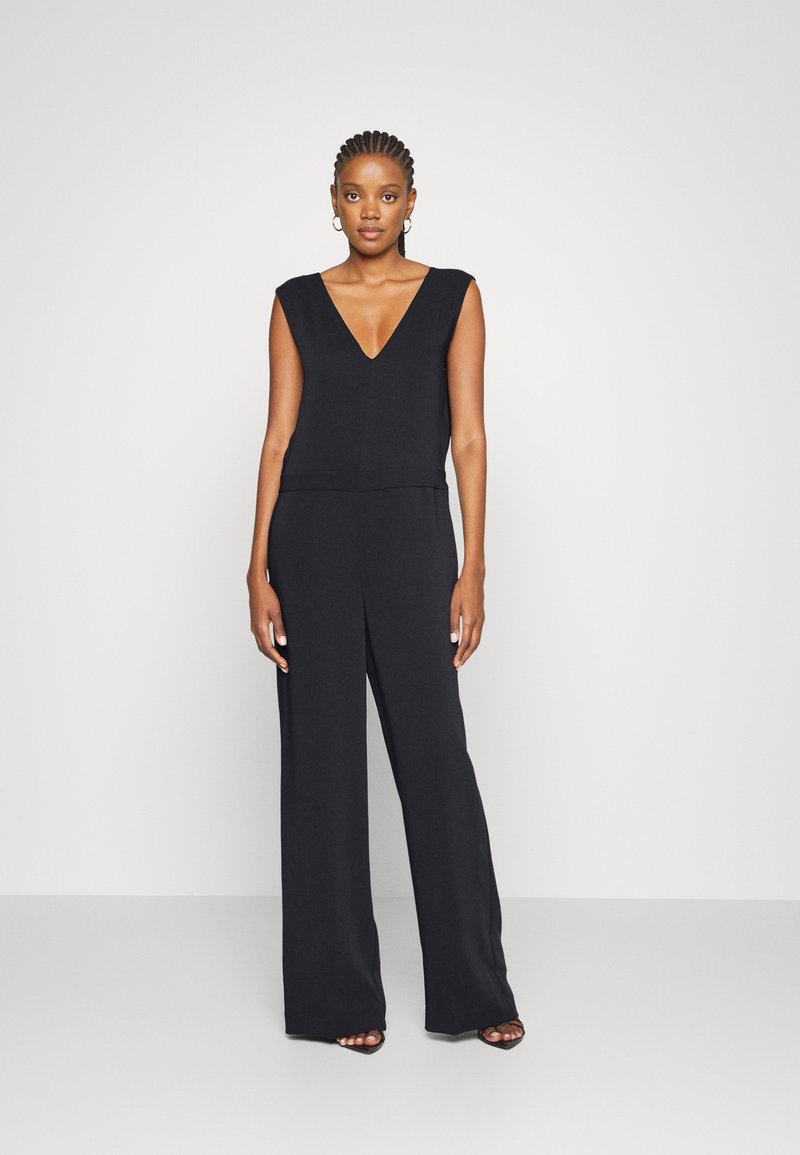 Calvin Klein TRAVEL V NECK Jumpsuit black/zwart Zalando.nl