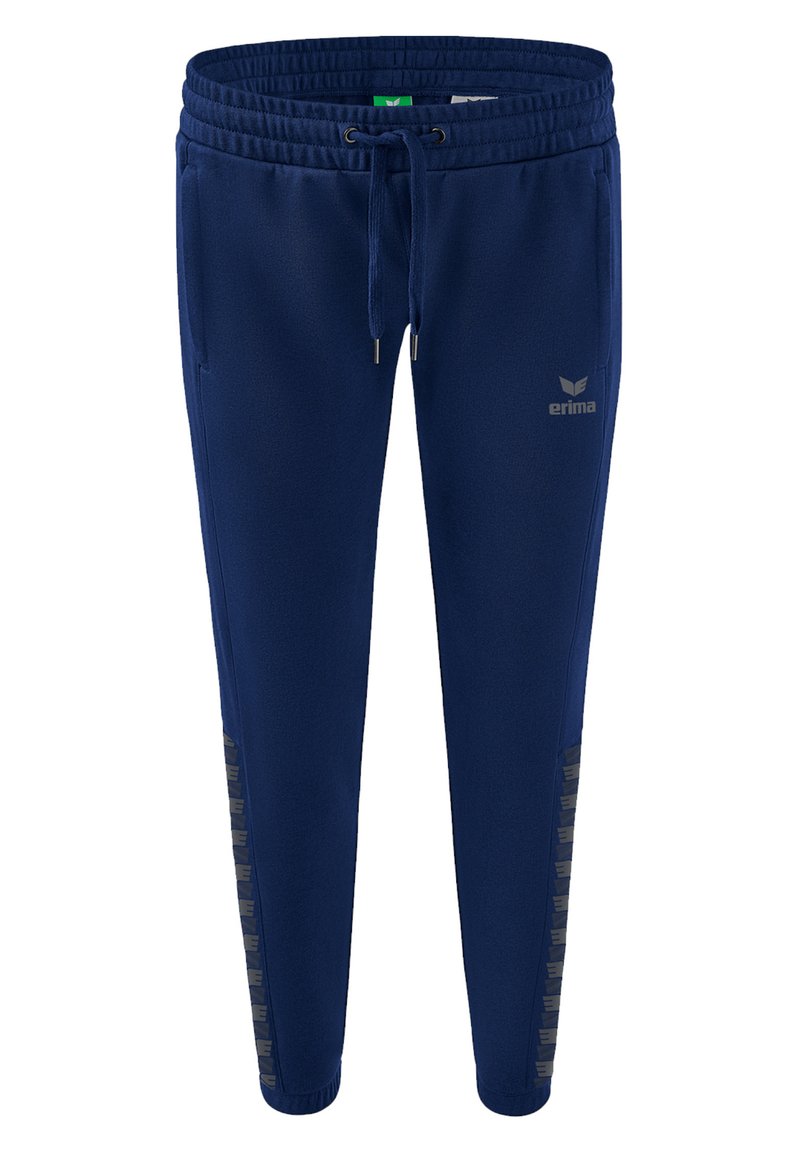 Pantalons de survêtement bleu marine avec taille élastique et cordon de serrage. Présente un logo sur le côté et des accents à motifs le long de la jambe. Tissu doux.