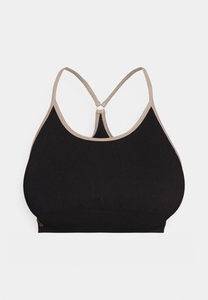 Schwarzer BH mit nahtloser Gestaltung, ausgestattet mit einem beigen Besatz und verstellbaren, gekreuzten Trägern auf der Rückseite. Weicher, dehnbarer Stoff.