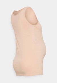 Top de maternidade cor pêssego com decote em forma de U e design sem mangas, em forma ajustada, textura sem costuras e tecido elástico.