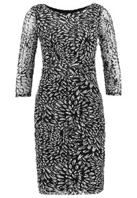 Schwarzes Spitzenkleid mit silbernem Blumenmuster, dreiviertellangen durchsichtigen Ärmeln und einer figurbetonten Silhouette. Texturiertes Material mit einem dezenten Glanz.