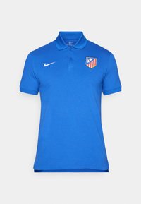 Blå polo t-shirt lavet af bomuld, med krave, tre-knap lukning, korte ærmer og et rødt og gult klublogo på venstre bryst.