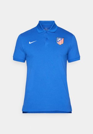 Polo shirt blu in cotone, con colletto, pattina con tre bottoni, maniche corte e logo del club rosso e giallo sul petto sinistro.