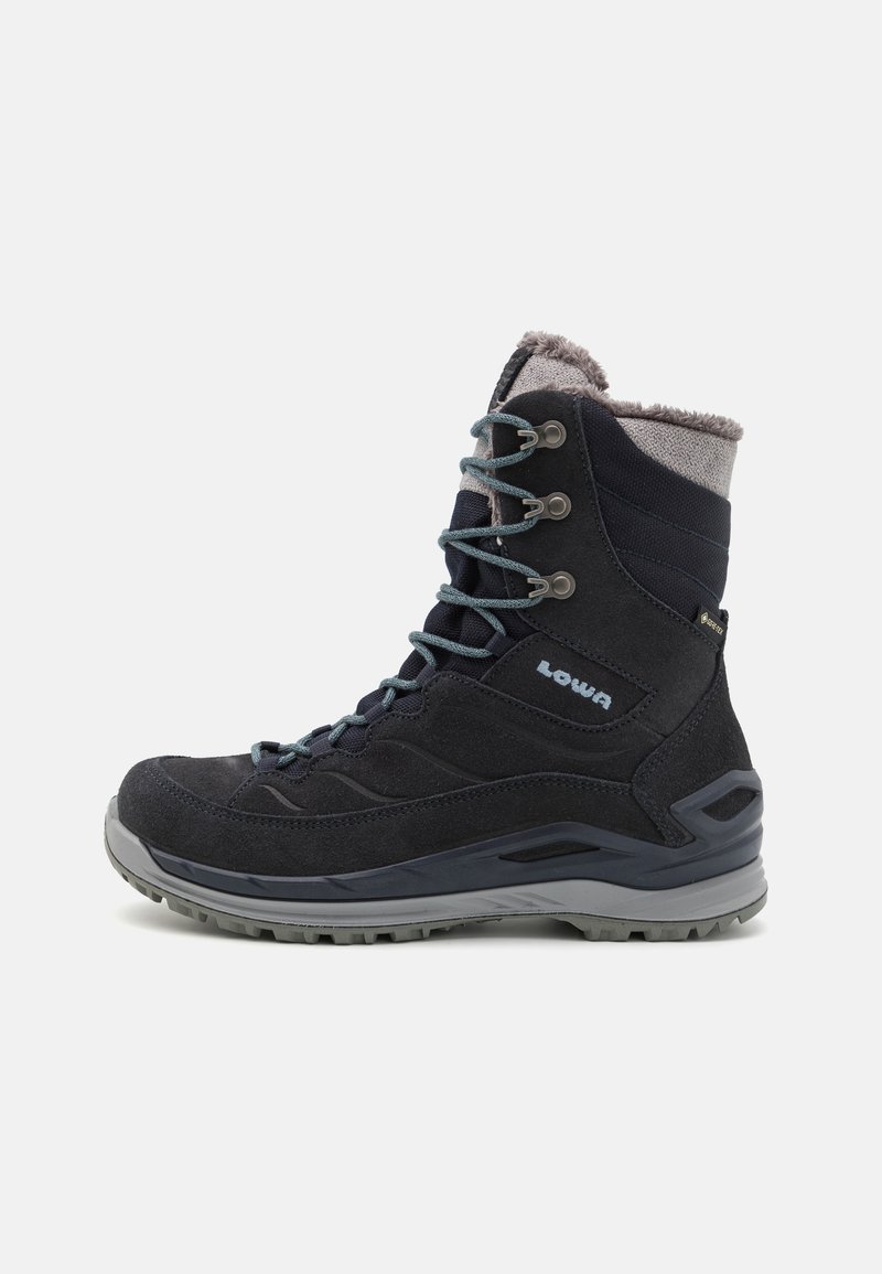 Lowa hiking boot in dark blue suede with grey accents. Features a soft grey lining and durable gray rubber sole. Lace-up design with metal eyelets.