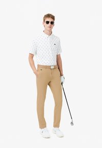 Lacoste Pantaloni - beige-s