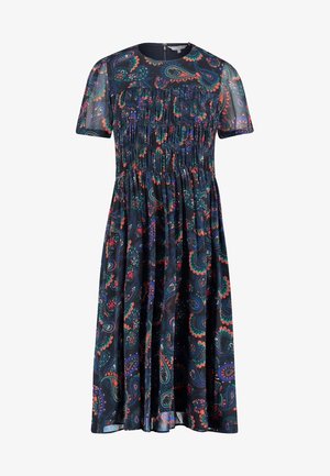 Korte mouw, jurk tot de knie in donkere stof met een paisleypatroon in rood, groen en blauw. Bevat geplooide details op het lijfje.