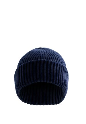 Bonnet tricoté bleu foncé avec un revers plié et une texture côtelée, présenté sur fond blanc.