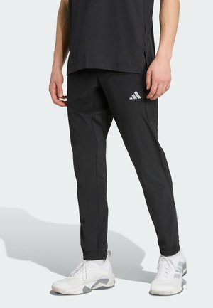 TECH APP - Pantalones deportivos - black   carbon