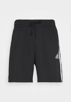 Pantalones cortos negros de Adidas con cinturilla elástica y cordón, con tres rayas blancas a los lados y el logo de Adidas en la pierna izquierda.