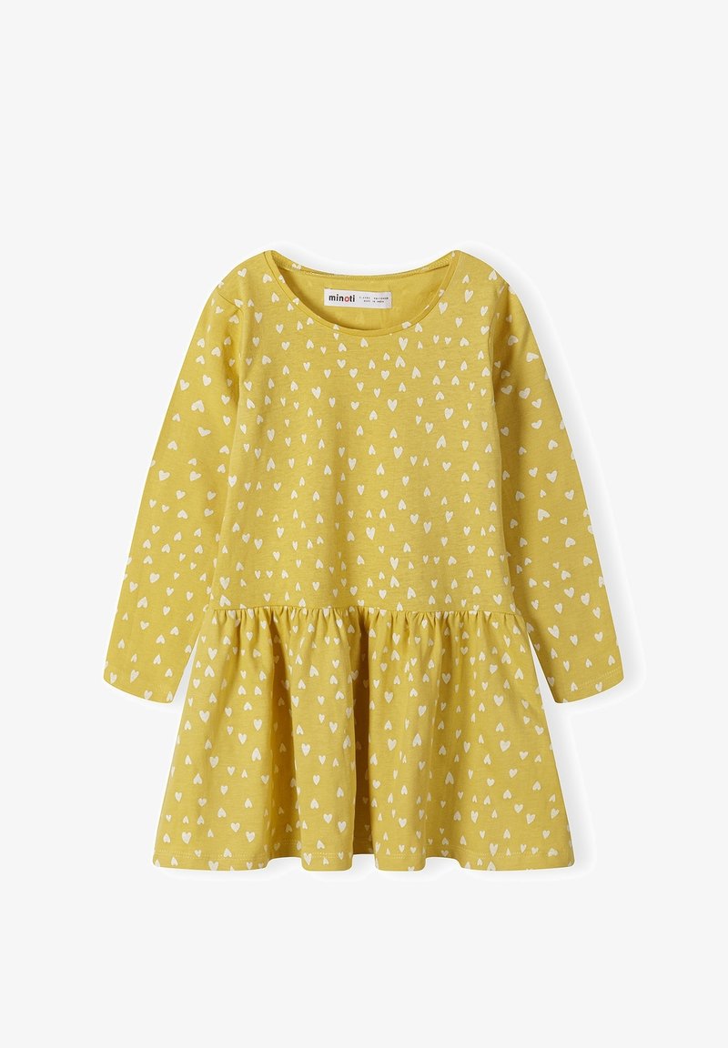 Robe jaune à manches longues avec une jupe froncée, présentant un motif de petits cœurs blancs. Fabriquée en tissu doux et texturé. Encolure ronde.