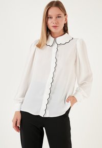 Unselected, ecru black
