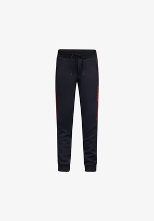 Zwarte joggingbroek van zachte stof met een tailleband met trekkoord, ritszakken en rode accenten aan de zijkanten. Aansluitende boorden bij de enkels.