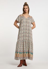 Maxikleid aus leichtem Stoff, mit einem floralen Druck in lebendigen Farben, einem V-Ausschnitt, kurzen Ärmeln und einem gestuften Saum. Mit einem detaillierten Rand akzentuiert.