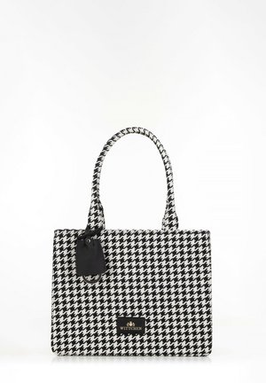 Borsa a mano in tessuto con motivo houndstooth in bianco e nero, dotata di due manici, un'etichetta nera e una placca con logo sul davanti. Materiale in tessuto testurizzato.