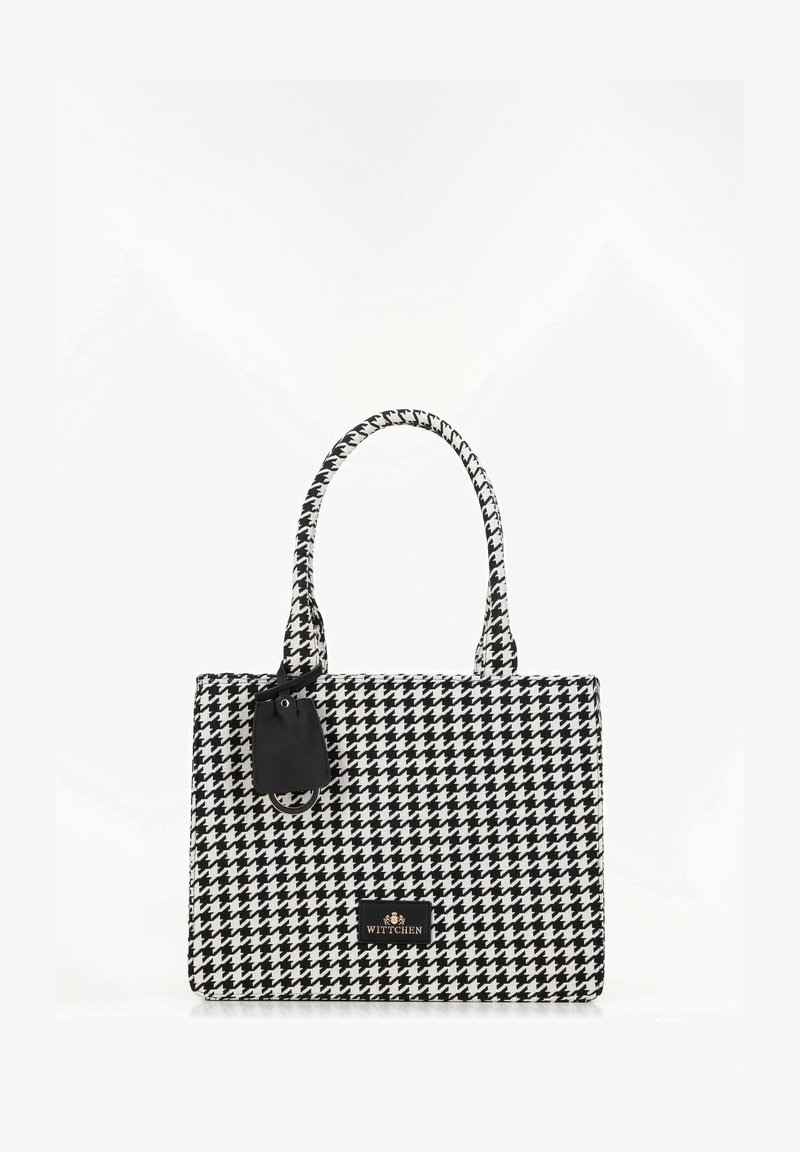 Borsa a mano in tessuto con motivo houndstooth in bianco e nero, dotata di due manici, un'etichetta nera e una placca con logo sul davanti. Materiale in tessuto testurizzato.
