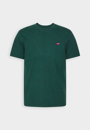 Zielona bawełniana koszulka z krótkim rękawem i okrągłym dekoltem. Posiada małe czerwone logo Levi's po lewej stronie klatki piersiowej. Miękka tekstura.